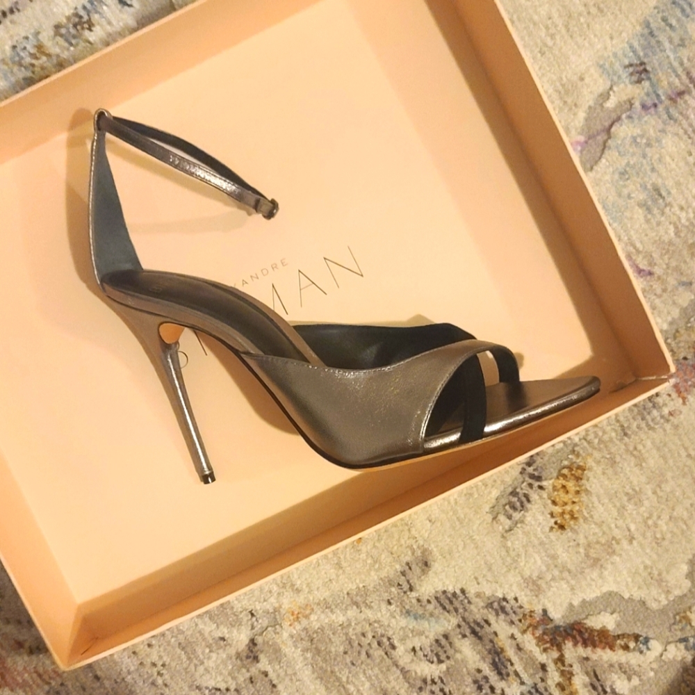 The Selena two-tone heel from Alexandre Birman mixes shining silver leather with